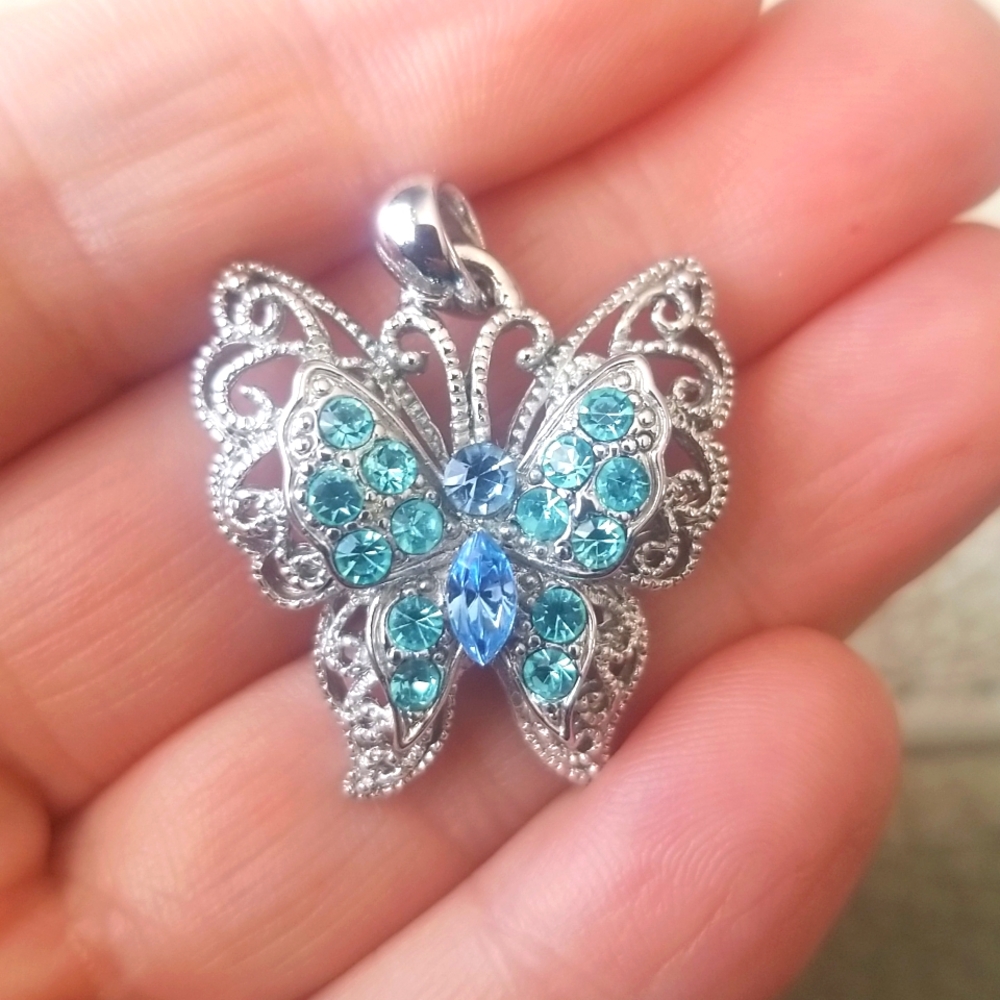 Elegant Silver Butterfly Pendant with Blue Stone Accents – Graceful & Stunning